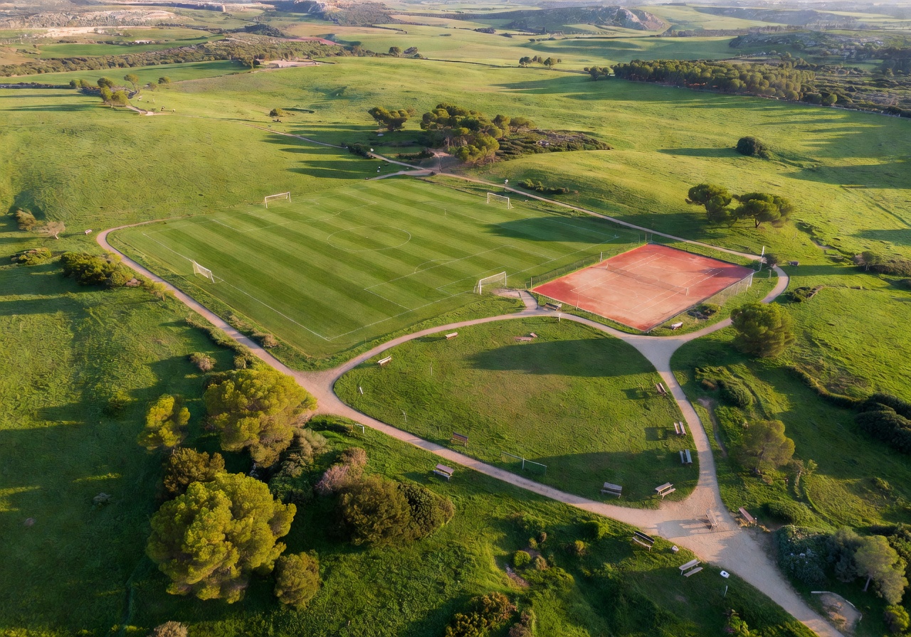 Ta Qali National Park aerial view showing vast green fields and recreational spaces in central Malta
